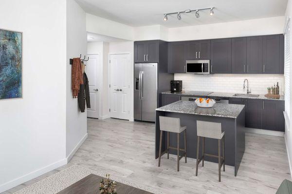 Kitchen in studio floor plan at Camden Central high-rise apartments in St. Petersburg, FL