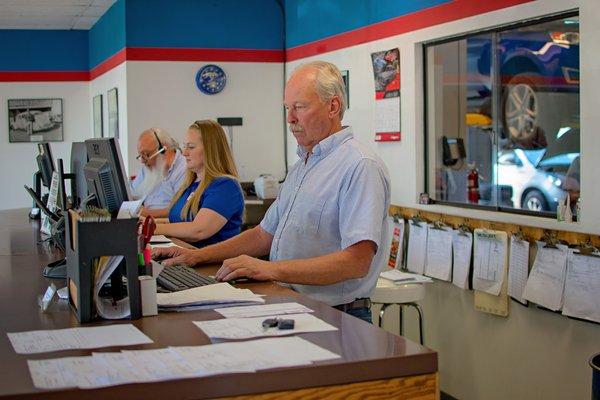 Rob, Jenna, and Al at the front counter.