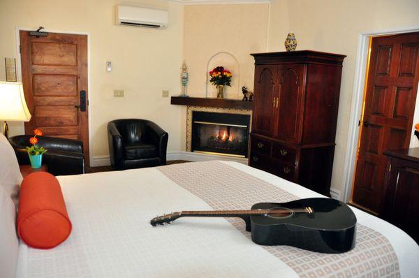 Room 213. Deluxe king with fireplace and balcony