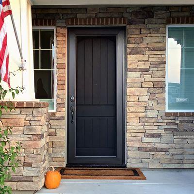 Professional security screen door installation for front door protection in Austin. Viewguard style pictured.