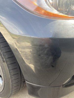 Front bumper paint damage