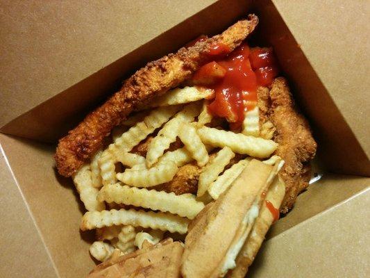 Spicy chicken tenders, waffles, and fries