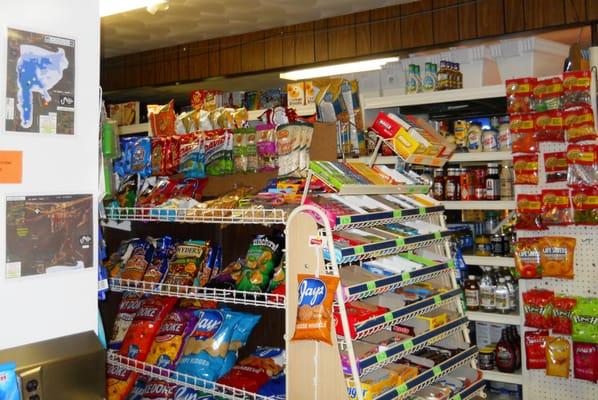 View looking out from deli area, cold beverage case beyond. Surprisingly many choices here.