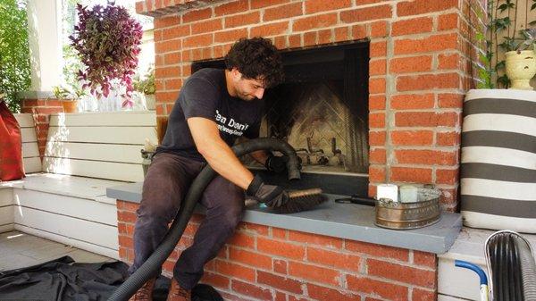 Inspection and cleaning at a residential outdoor fireplace