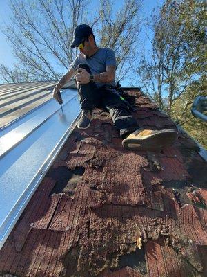 Roof repair damaged tin