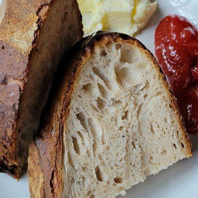 Sourdough bread with whipped butter and tomato jam. Bread was warm. All components were very fresh tasting.