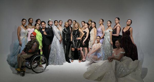 The designer surrounded by her models in her private colorado fashion show in may 2023