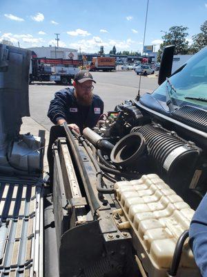 Andy, our shop lead inspecting a customers vehicle in for service!