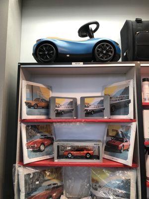 BMW Shop inside the Service Center sells baby toy riding cars and die cast model cars