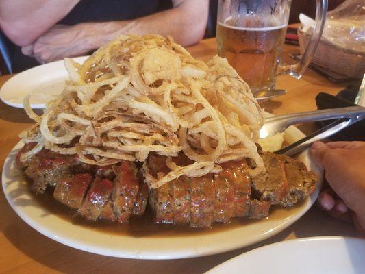 Meatloaf and mash potato and onion rings is huge!