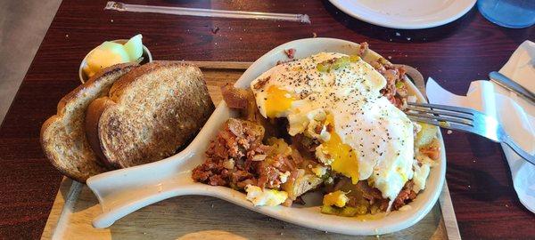 Mexican Skillet with chorizo, potatoes, two eggs, toast & fruit cup.