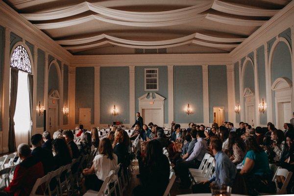 The ballroom had 220 chairs set up and 20 tables and still had room to spare!