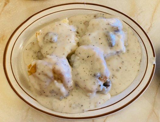 Biscuits'N Gravy Southern' Style: Country Sausage Gravy Served over Two Homemade Buttermilk Biscuits.