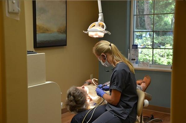 Hygienist with patient