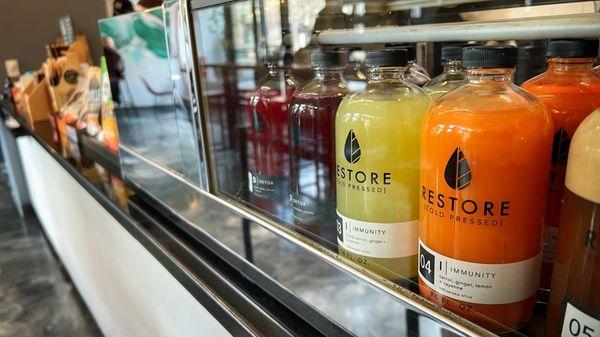 Front counter with a wonderful variety of fresh pressed juices.