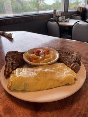 Veggie omelette, fruit and marble rye toast