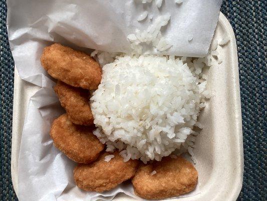 Chicken nuggets with rice.