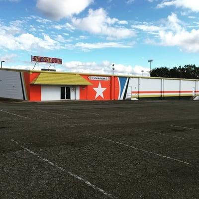 The outside of our newly painted building!