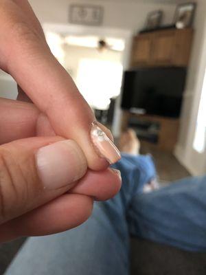 Acrylic not covering entire nail.