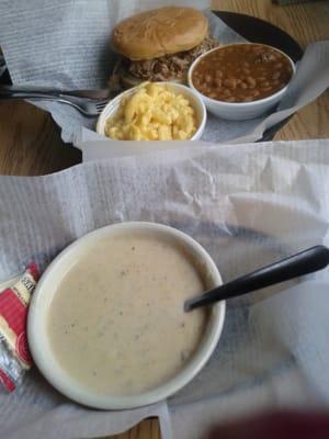 She crab soup and baked beans, mac and cheese and chopped pork sandwich