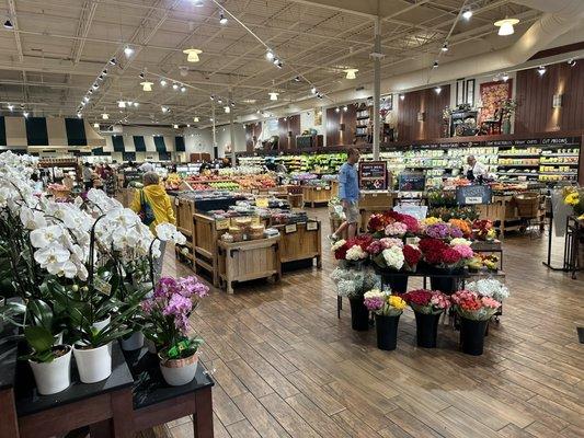 Entrance - floral and fresh fruits/produce.