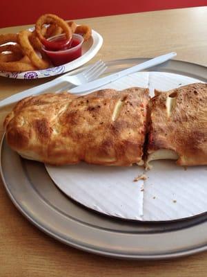 Buffalo Chicken Calzone and Onion Rings.