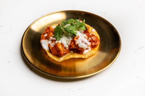 Our top selling butter chicken tostada!