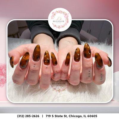 Autumn's rich tones and earthy textures match your luxurious nails perfectly. 
Discover the beauty of seasonal elegance.