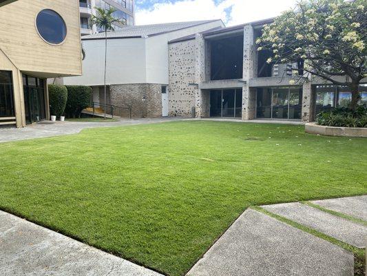 another green area across the church