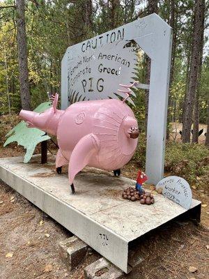 Lakenenland sculpture - the greed of capitalism dumping on the American worker