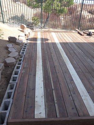 Deck Rebuild - Replaced broken planks, re-secured loose boards, sanded and re-stained deck.