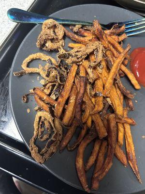 Burnt onion rings and cold SWEET POTATO FRIES