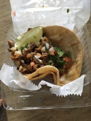 Al pastor taco, delicious and cheap, only $2