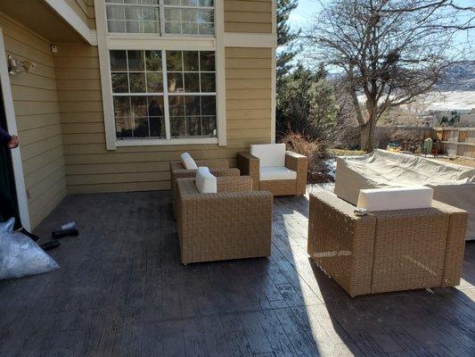 Stamped wood plank concrete deck.