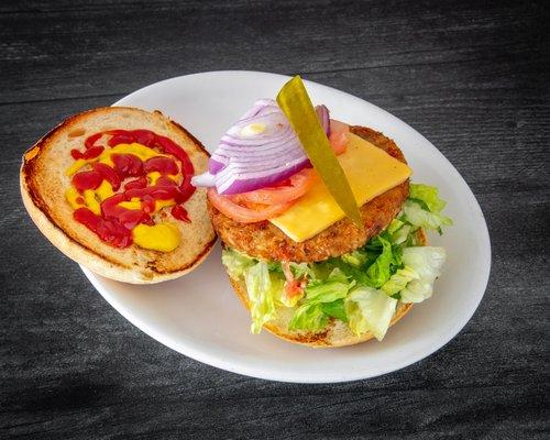 The veggie burger on a hot brioche .