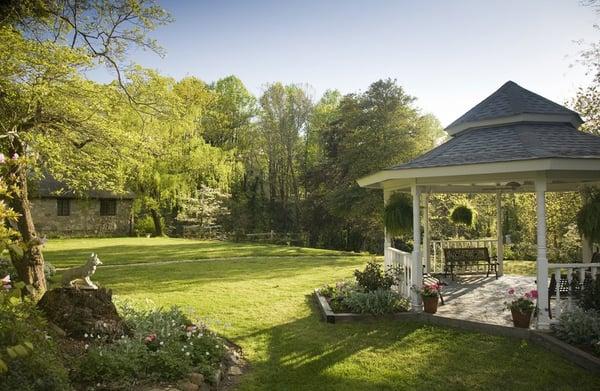 Enjoy year-round flowering gardens on our quiet and secluded landscaped grounds, yet just a 5 minute walk to downtown Tryon.