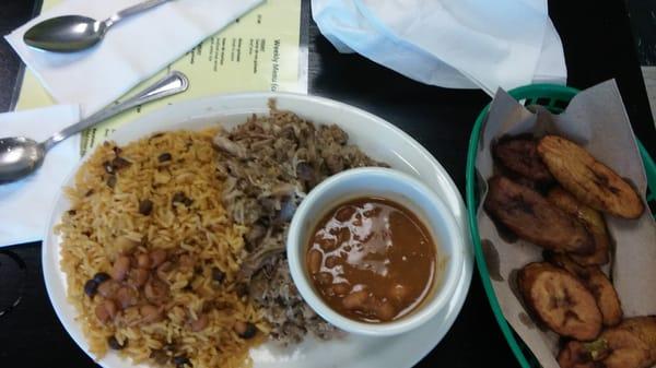 Pernil, yellow rice with pigeon peas, and pink beans in the cup. Plus fried sweet plaintain.