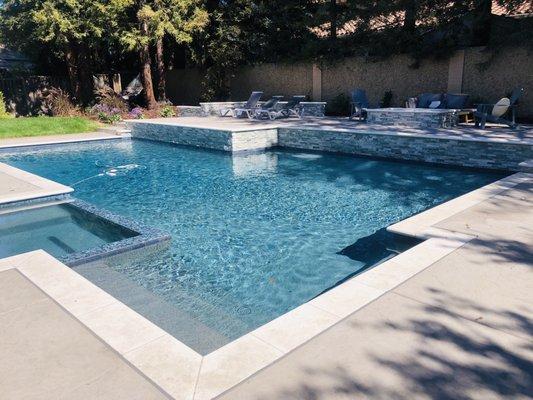 New pool with tropics blue pebble tech finish