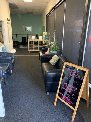 Waiting area and entrance to Reformer and barre area.