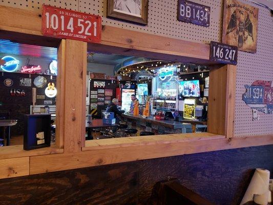 Bar framed from Rustic Dining area.