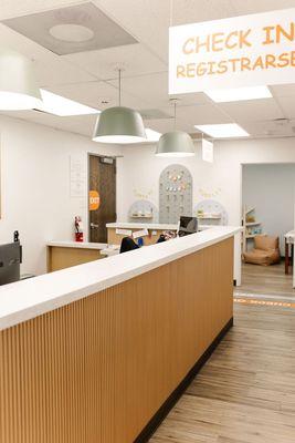 Reception area to greet and check in pediatric patients