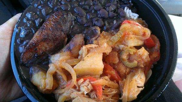 Fricase bowl (saucy chicken) -  comes with white rice, black beans, and 2 sweet plantains. No culture shock, I promise.