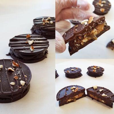 PB Carametzelle! Creamy peanut butter and caramel with pretzel bits, sandwiched between quality Belgian dark chocolate discs!