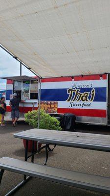 Truck and seating in parking lot