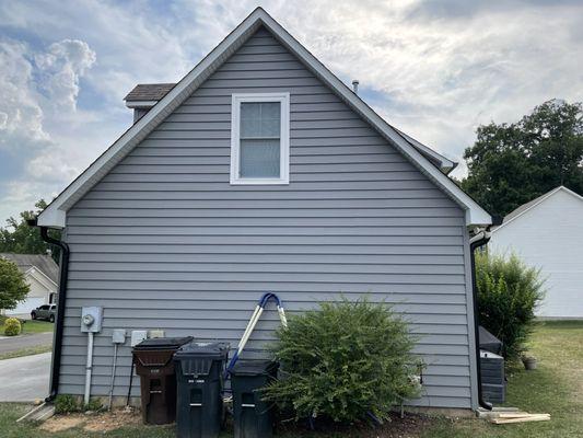 New gutters, siding, and window.