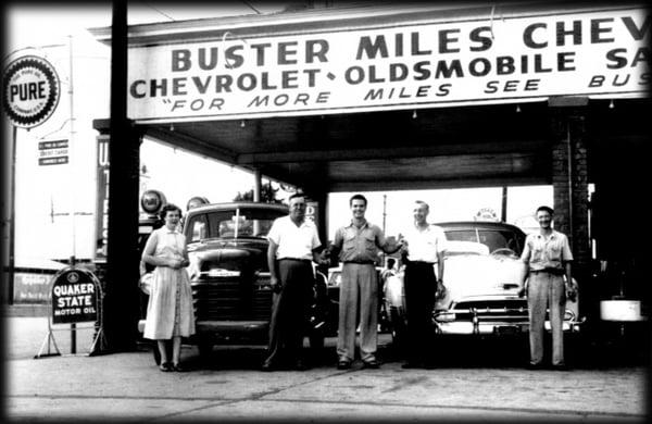 Buster Miles, in 1949, handing keys to his 1st customers at the original downtown Heflin, AL., Chevrolet location.