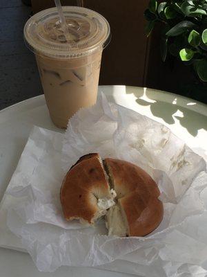 Small french vanilla iced coffee with 1 cream 1 sugar, and a plain bagel toasted with cream cheese.