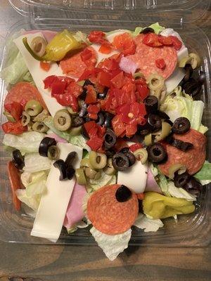 Small antipasto salad before pouring yummy "House" dressing all over it!