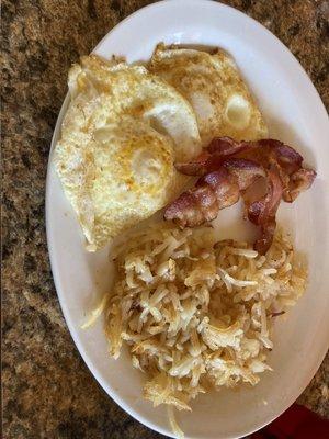 Hash browns, 2 eggs, and twi strips of bacon, cost a little under $9.    Beware that 2 Strips of bacon costs $4.