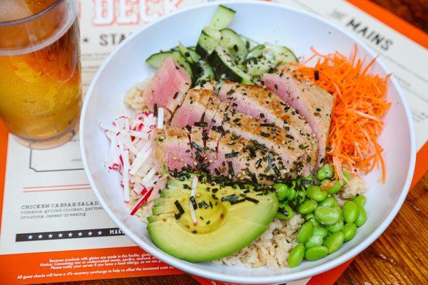 Seared Ahi Bowl: avocado, radish, edamame, shredded carrot, cucumber, brown rice, honey-ponzu aioli, wasabi furikake, bonito flake